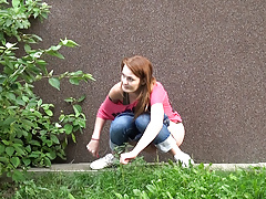 Shy and cowardly redhead pees outside