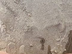 Pissing on sand
