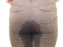 Hot peeing here tight grey pants with vpl 2