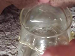 Pissing into a cup