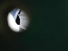 Spying on a baffle pissing at hardware store